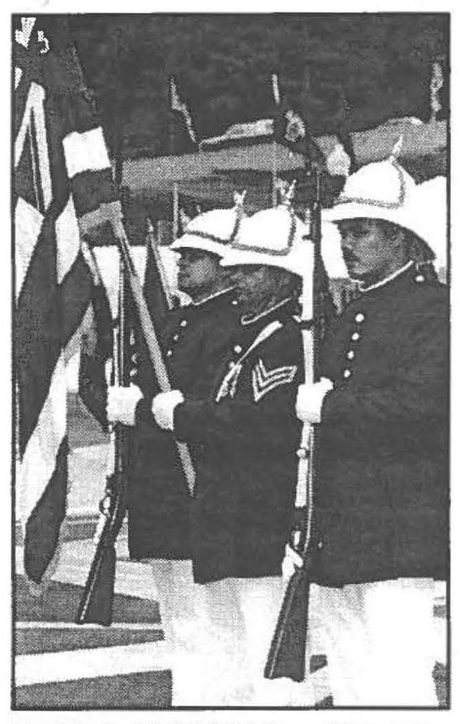 ROYAL HONORS -- Ceremonial Royal Guard post the State Colors.