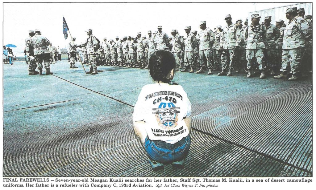 FINAL FAREWELLS - Seven-year-old Meagan Kualii searches for her father, Staff Sgt. Thomas M. Kualii, in a sea of desert camouflage uniforms. Her father is a refueler with Company C, 193rd Aviation. Sgt. 1st Class Wayne T. Iha photos
