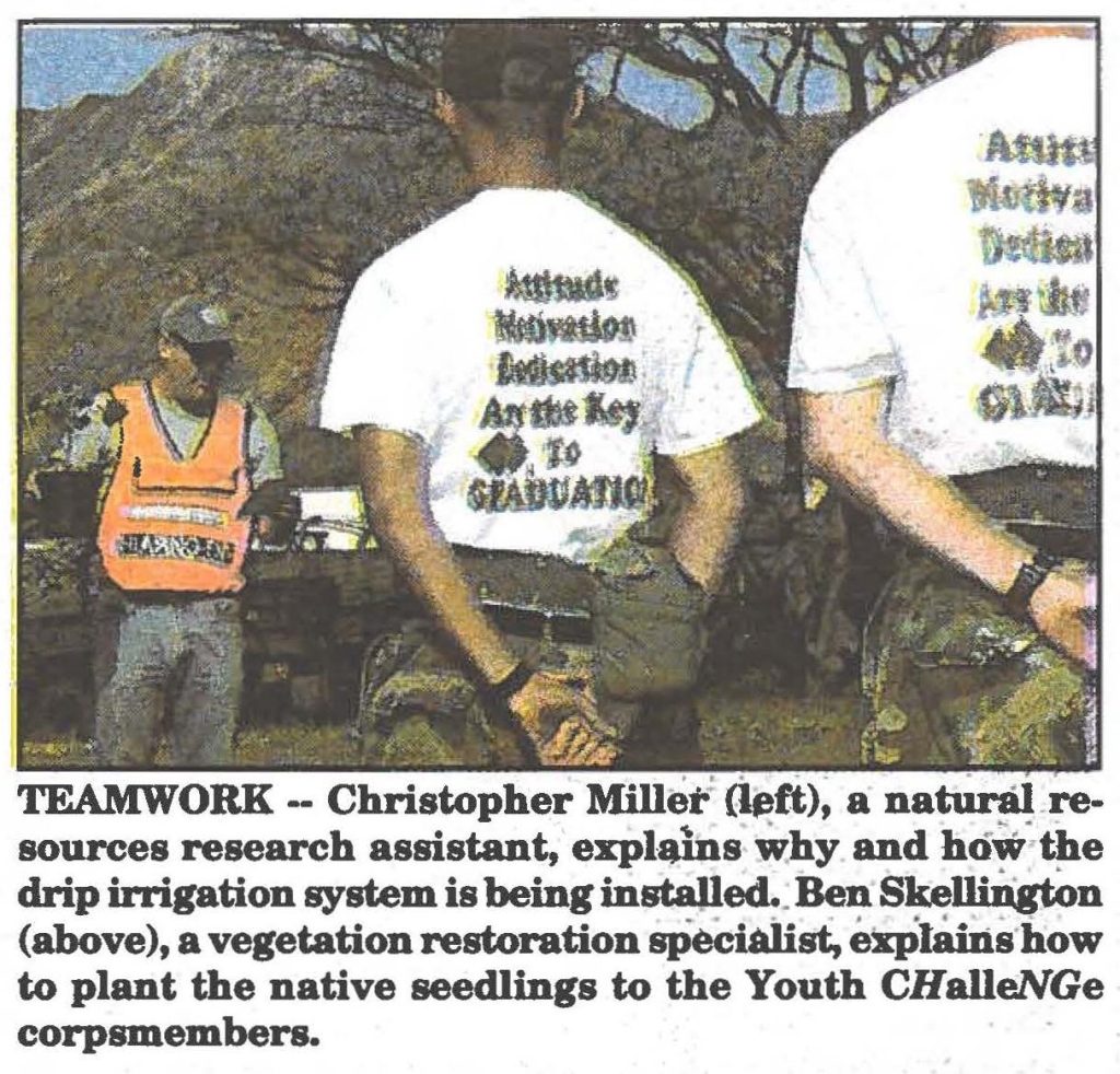 TEAMWORK -- Ben Skellington, a vegetation restoration specialist, explains how to plant the native seedlings to the Youth CHalleNGe corpsmembers.