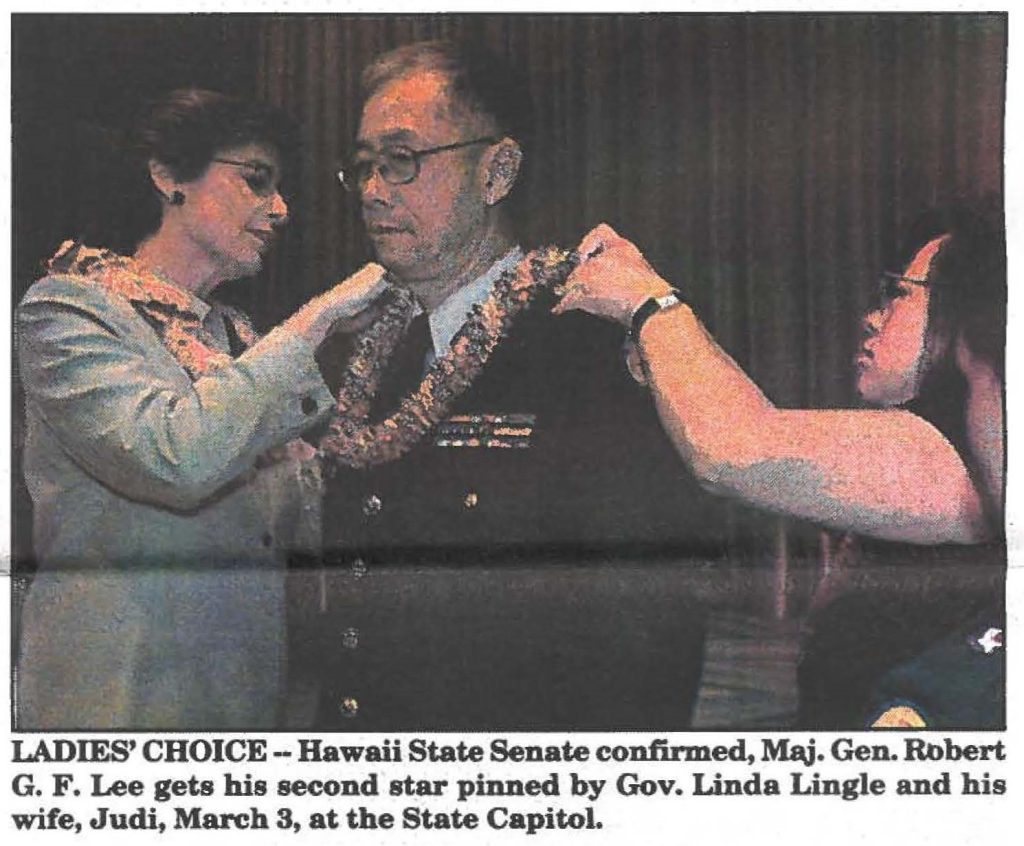 LADIES' CHOICE - Hawaii State Senate confirmed, Maj. Gen. Robert G. F. Lee gets his second star pinned by Gov. Linda Lingle and his wife, Judi, March 3, at the State Capitol.