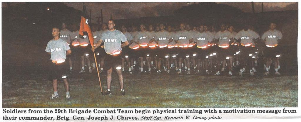 Soldiers from the 29th Brigade Combat Team begin physical training with a motivation message from their commander, Brig. Gen. Joseph J. Chaves. Staff Sgt. Kenneth W. Denny photo