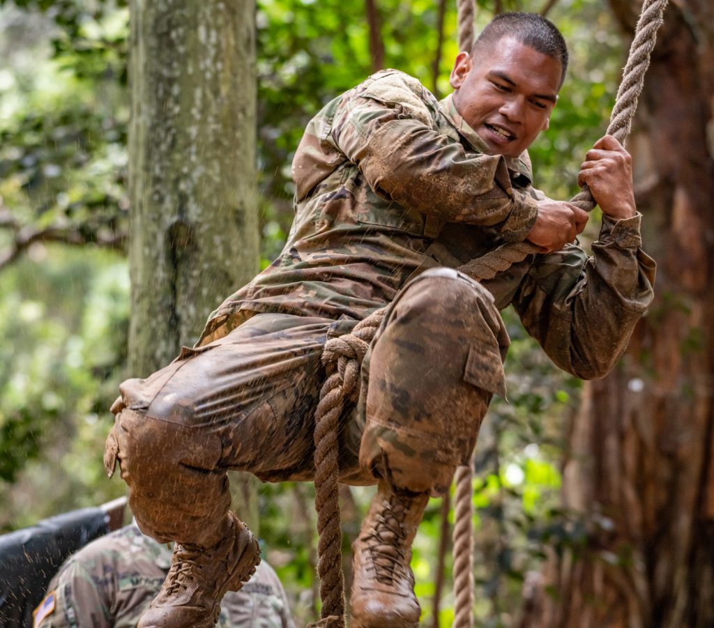 Spc. Kaulana Saltiban, with the 230th Engineer Company, maneuvering through an obstacle in his timed run through the obstacle course during the 2020 Best Warrior Competition held at Schofield Barracks, Hawaii, from March 6-8, 2020. The Best Warrior will receive the opportunity to represent the Hawaii Army National Guard at the Regional level. (U.S. Army National Guard photo by Sgt. John Schoebel)