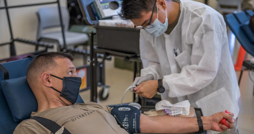 Hawaii National Guard Donates Blood to the Armed Services Blood Program Col James Barros, Chief of Staff of the Joint Task Force, Hawaii National Guard during the COVID-19 response donated blood to the Armed Services Blood Program (ASBP), August 26, 2020, Kalaeloa, Hawaii. The ASBP received over 60 blood donations from HING Soldiers and Airmen over the first two days. (U.S. Army National Guard photo by Sgt. John Schoebel)