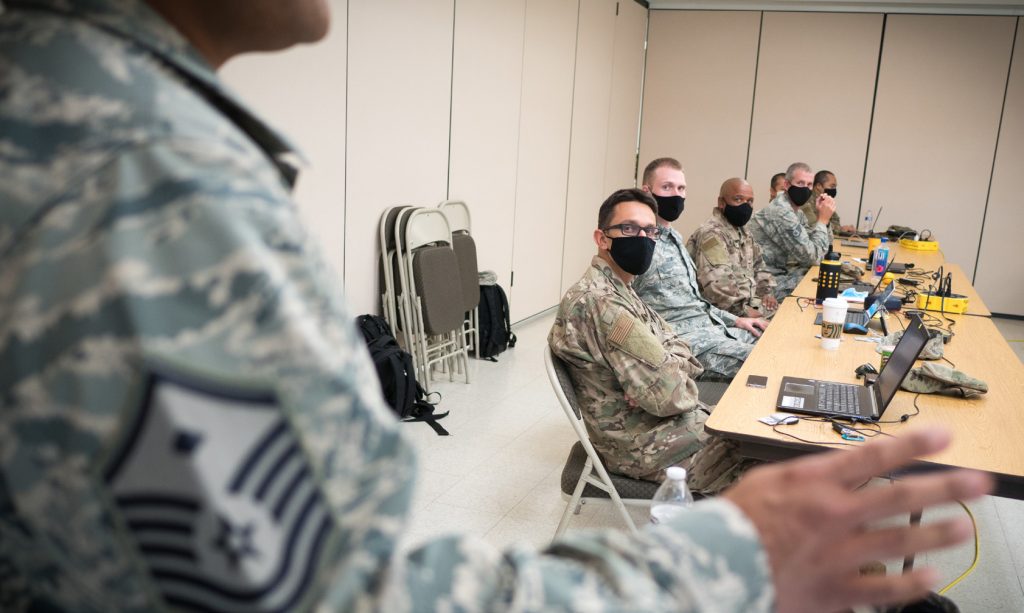 Members of the 291st Combat Communications Squadron participate in a training activity June 7, 2020, at Joint Base Pearl Harbor-Hickam, Hawaii. The team of Airmen set up a mobile training station as a means to conduct their weekend drill, without relocating to their geographically separated unit, based in Hilo. Members of the Hawaii Air National Guard have been reducing their routine travel routes as a measure to prevent the spread of disease. (U.S. Air National Guard photo by Senior Airman John Linzmeier)