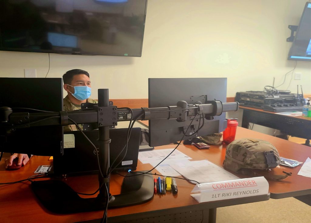 First Lieutenant Riki Reynolds, commander of Company A, Task Force Oahu, Hawaii National Guard, oversees a team of Guardsmen assisting with the manual verification and updating of visitors test results registered in the Safe Travels Hawai‘i program, November 16, 2020, 298th Multi-Functional Training Regiment located in Waimanalo, Hawai‘i.