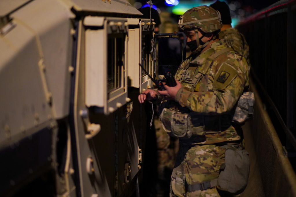 U.S. Army Sgt. Ryan Langus, Hawaii National Guard, performs traffic security operations in Washington, D.C, Jan. 19, 2021. At least 25,000 National Guard men and women have been authorized to conduct security, communication and logistical missions in support of federal and District authorities leading up and through the 59th Presidential Inauguration. (U.S. Air National Guard video by Master Sgt. Andrew Jackson)
