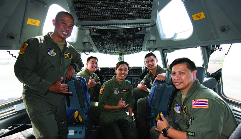 An all-Asian American and Pacific Islander aircrew from the 204th and 535th Airlift Squadrons conduct a training mission on a C-17 Globemaster III May 25, 2021, at Joint Base Pearl Harbor Hickam, Hawaii. In observance of AAPI Heritage Month, the aircrew joined other aircraft, flown by AAPI Airmen, in a practice refueling mission. AAPIs in the military and maintain a legacy of service and sacrifice set by those before them. (U.S. Air National Guard photo by Staff Sgt. Orlando Corpuz)