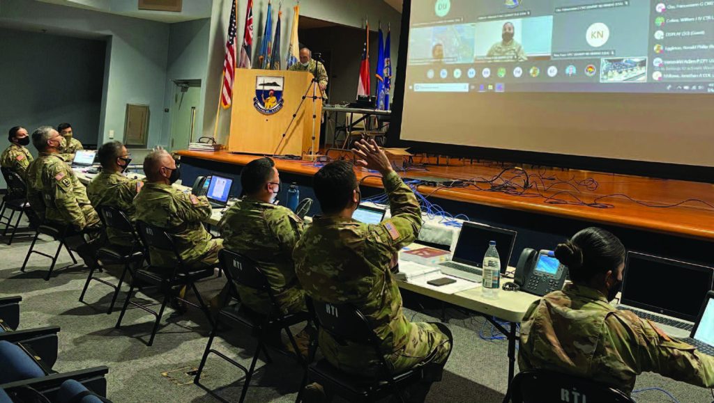 Hawaii Army National Guard Soldiers address the Singapore Armed Forces during the virtual “Hand Shake” at Exercise Tiger Balm 2021 held at the 298th Regiment, Regional Training Institute (RTI), Waimanalo, Hawaii, May 6, 2021. This celebrates the 40th anniversary of Exercise Tiger Balm occurring in Hawaii from May 6 – 13, 2021. (U.S. Army National Guard photo by Capt. Shaoyu L. Lee)