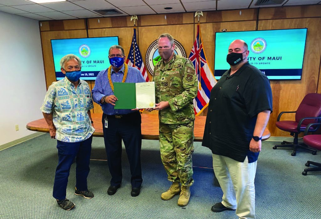 Mayor Michael Victorino speaks with Lt. Col. Todd Curtright during a proclamation presentation on Tuesday for Hawaii National Guard Appreciation Day. National Guard personnel have been important partners with Maui County in its response to the COVID-19 pandemic. Beginning in March 2020, men and women of the Hawaii National Guard conducted screening of passengers at airports and harbors, assisted with road closures, established quarantine facilities, did logistics planning, staffed mobile testing sites and undertook many other emergency response measures. Mahalo for all these citizen soldiers for their service with aloha.