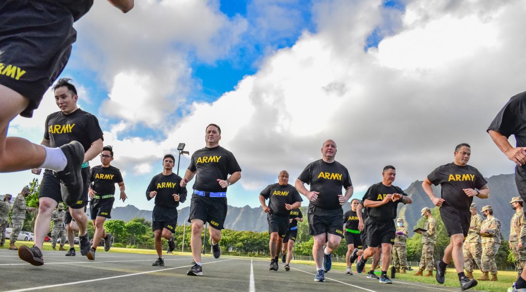 Hawaii Army National Guard Soldiers from a variety of units within the 103rd Troop Command start the 2 mile run (2MR) event during the Army Combat Fitness Test, Waimanalo, Hawaii, April 2, 2021. The 2MR measures aerobic endurance, which is required for conducting continuous operations and ground movements on foot. The six-event readiness assessment, ACFT, is intended to replace the current three-event Army Physical Fitness Test, which has been around since 1980. (U.S. Army National Guard photo by Sgt. 1st Class Theresa Gualdarama)