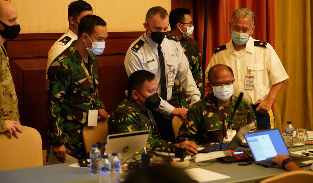 The G6 Cyber team composed of service members from the Tentara Nasional Indonesia (TNI), Hawaii Army National Guard, Hawaii Air National Guard and the US. Army conduct mission analysis for the Joint Exercise GEMA BHAKTI scenario, September 22, 2021, Jakarta Indonesia. GB21 is a Chairman, Joint Chiefs of Staff (CJCS) staff exercise (STAFFEX) between USINDOPACOM (and components) and TNI (and components), and is designed to improve joint, operational-level staff planning and processes. It also promotes positive military relations, assuring security and stability in the region, increases cultural awareness, and enhances command and control proficiency. (U.S. Air National Guard photo by Master Sgt. Andrew Jackson)
