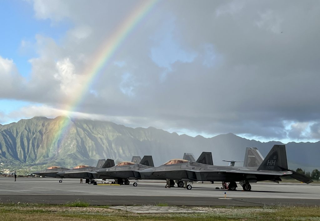 F-22 Raptors assigned to the Hawai‘i Air National Guard 199th Fighter Squadron and the active duty 19th Fighter Squadron, are staged on the flightline of Marine Corps Base Kaneohe, HI Mar. 3, 2022 during Agile Combat Employment exercise Hoʻoikaika. ACE is an operational concept that leverages networks of well-established and austere air bases, multi-capable airmen, pre-positioned equipment, and airlift to rapidly deploy, disperse and maneuver combat capability throughout a theater. (U.S. Air National Guard photo by 2nd Lt. James Ro)