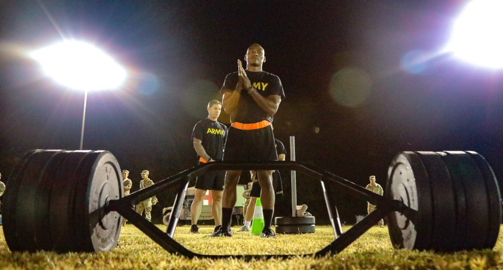 Hawai‘i Army National Guard (HIARNG) Soldier Spc. Kevin T. Brown, a mass communications specialist assigned to the 117th Mobile Public Affairs Detachment (MPAD), 103rd Troop Command, prepares to perform the maximum dead-lift (MDL) event during the annual Best Warrior Competition Army Combat Fitness Test (ACFT) at the Regional Training Institute (RTI), Waimanalo, Hawai‘i, March 4, 2022. The MDL is a muscular strength test that represents movements required to safely and effectively lift heavy loads from the ground, jump, bound and tolerate landing. (U.S. Army National Guard photo by Sgt. Lianne M. Hirano