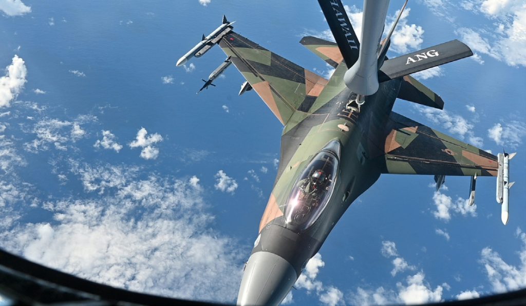 An F-16 Fighting Falcon assigned to the 18th Aggressor Squadron receives fuel from a KC-135 Stratotanker assigned to the 203rd Air Refueling Squadron during the Ho’oikaika Readiness Exercise March 5, 2022, near Oahu, Hawai‘i. During the exercise, the 18th Aggressor Squadron employed combat tactics alongside fifth generation F-22 Raptors from the 199th and 19th Fighter Squadrons in aerial combat over the Pacific Ocean. (U.S. Air National Guard photo by Mysti Bicoy)