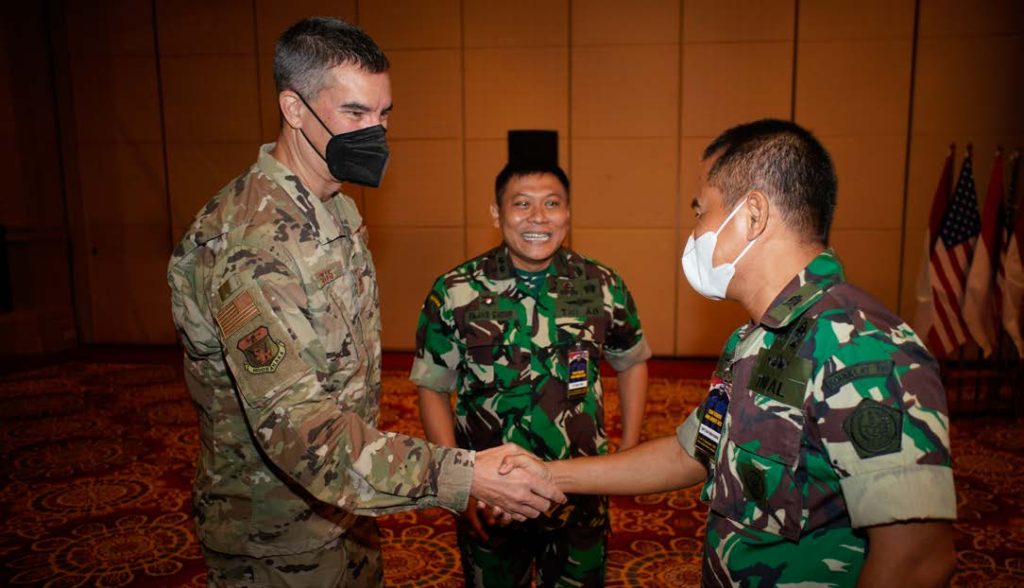 US Air Force Col. Kristoff Sills, Hawai‘i Air National Guard, and Lt. Col. Fajar Catur, TNI, discuss the 2nd round of academic lectures for day 2 of Gema Bhakti, September 10, 2022, Jakarta Indonesia. Gema Bhakti 22 is a USINDOPACOM Joint Exercise Program event, utilizing US Joint forces partnering with TNI Armed Forces working together to increase interoperability and enhance regional stability and security through bilateral and multilateral partnerships. (US Air Force Photo by Master Sgt. Andrew Jackson)