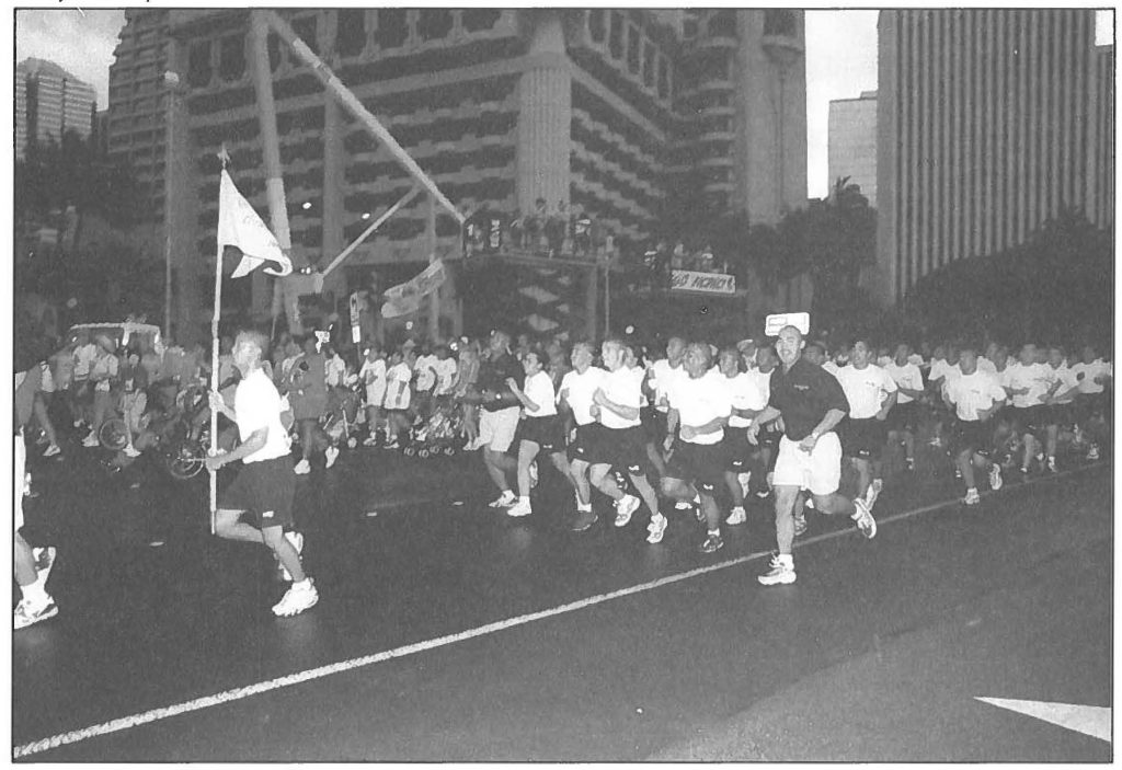 ALOHA RUNNING - Youth ChalleNGe corpsmembers run in formation at the annual Great Aloha Run, held Presidents Day in February. 30 Sgt. 1st Class Wayne T. Iha photo