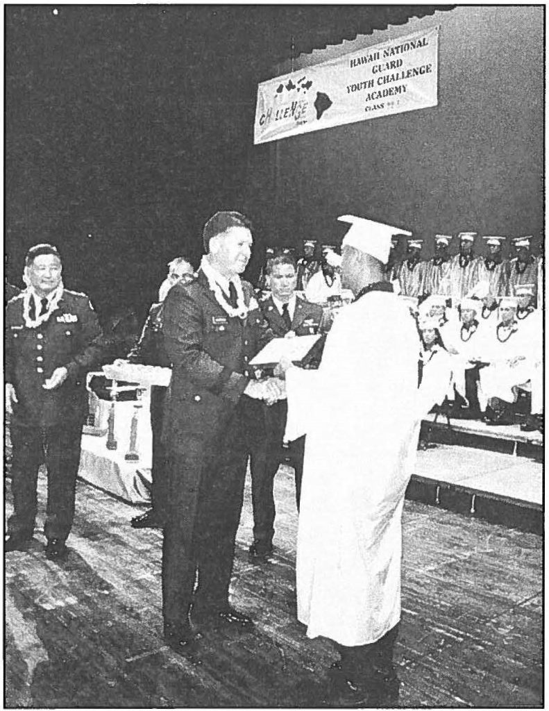 BRAND NEW DAY- Maj. Gen .. Edward L. Correa Jr., the adjutant general, presents diplomas to the 99-2 graduating class of the Hawaii National Guard Youth CHalleNGe Academy. Sgt. 1st Class Wayne T. Iha photo