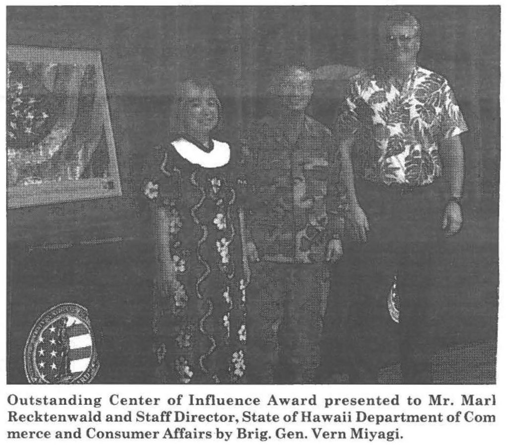 Outstanding Center of Influence Award presented to Mr. Marl Recktenwald and Staff Director, State of Hawaii Department of Commerce and Consumer Affairs by Brig. Gen. Vern Miyagi.