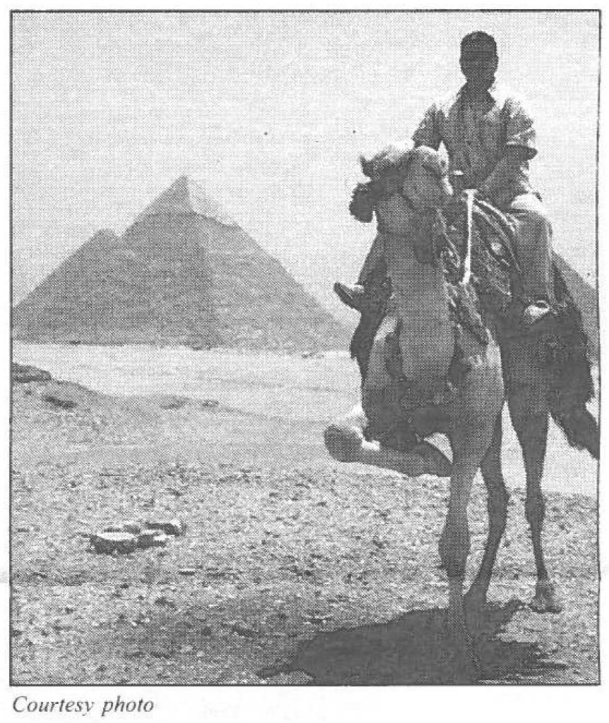 Right - Master Sgt. Eric Daido cruises his way through Egypt on the back of a camel.