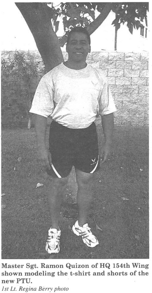 Master Sgt. Ramon Quizon of HQ 154th Wing shown modeling the t-shirt and shorts of the new PTU. 1st Lt. Regina Berry photo
