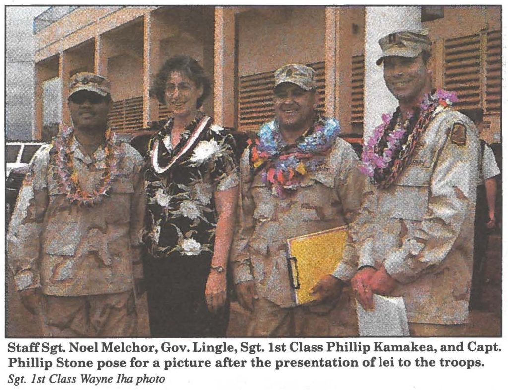 Staff Sgt. Noel Melchor, Gov. Lingle, Sgt. 1st Class Phillip Kamakea, and Capt. Phillip Stone pose for a picture after the presentation of lei to the troops. Sgt. 1st Class Wayne Iha photo