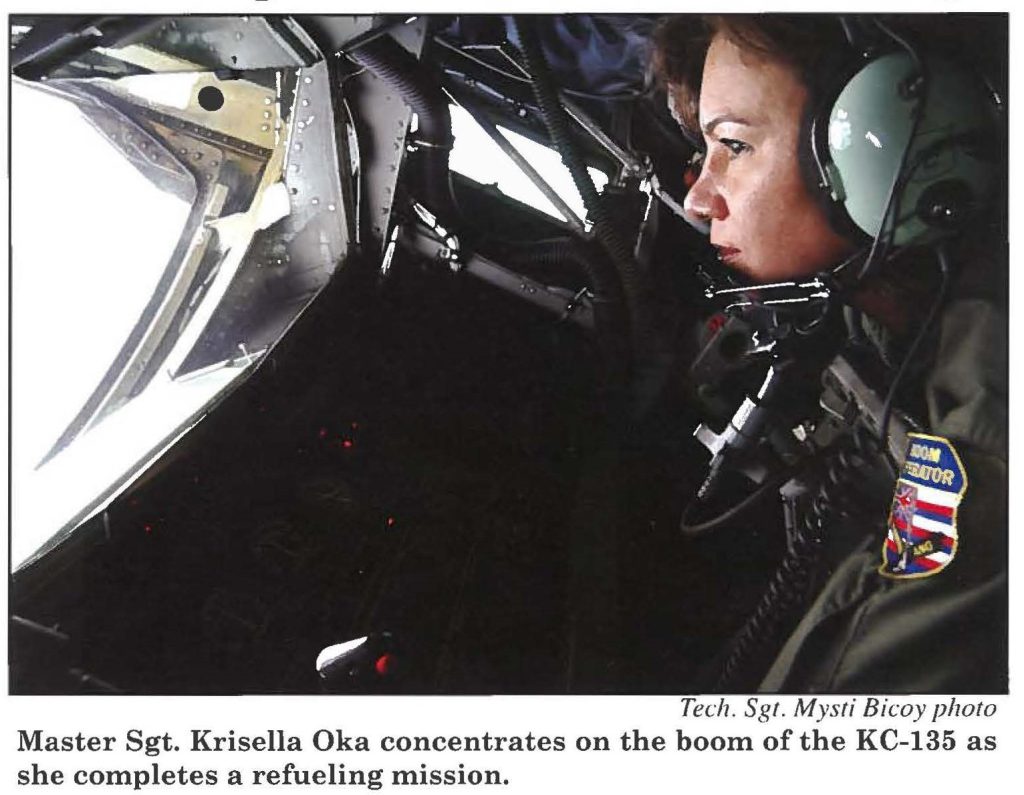 Master Sgt. Krisella Oka concentrates on the boom of the KC-135 as she completes a refueling mission.