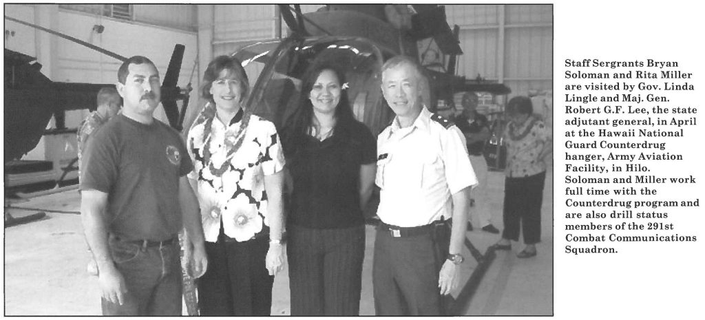 Staff Sergrants Bryan Soloman and Rita Miller are visited by Gov. Linda Lingle and Maj. Gen. Robert G.F. Lee, the state adjutant general, in April at the Hawaii National Guard Counterdrug hanger, Army Aviation Facility, in Hilo. Soloman and Miller work full time with the Counterdrug program and are also drill status members of the 291st Combat Communications Squadron.
