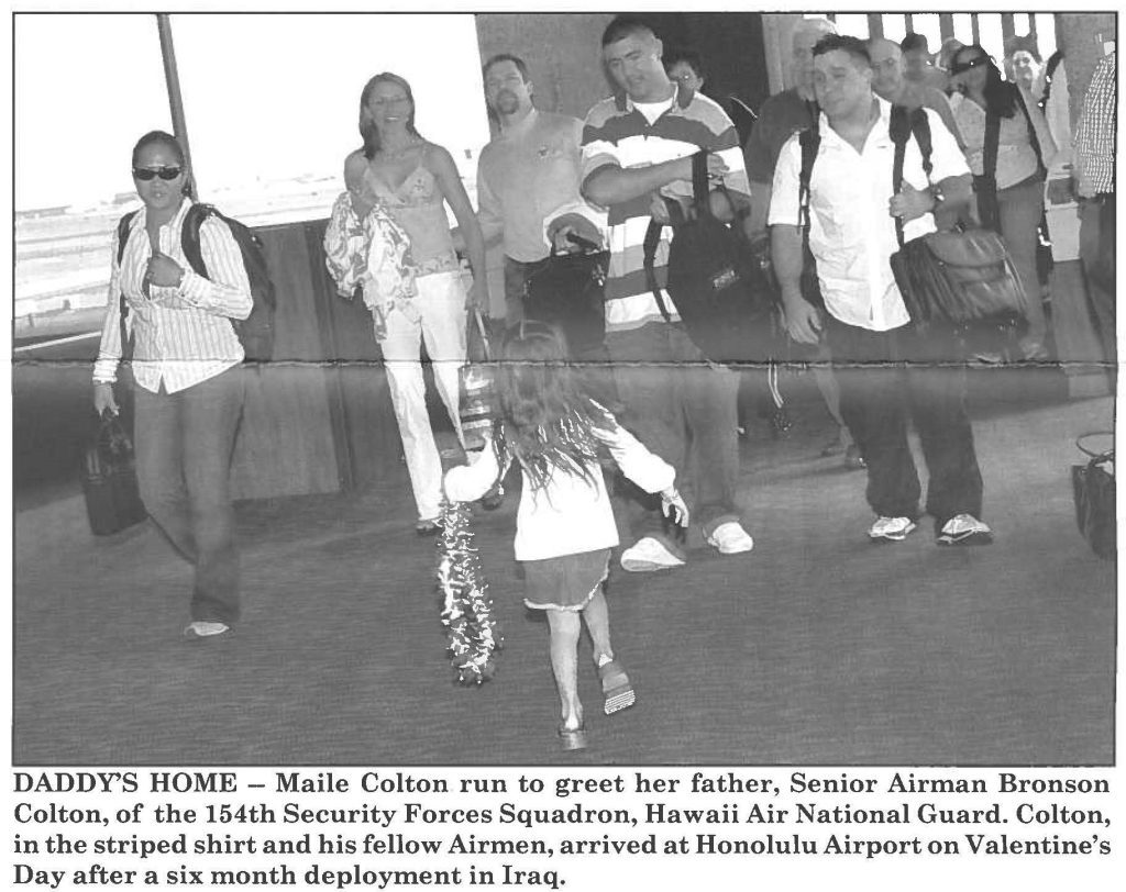 DADDY'S HOME - Maile Colton run to greet her father, Senior Airman Bronson Colton, of the 154th Security Forces Squadron, Hawaii Air National Guard. Colton, in the striped shirt and his fellow Airmen, arrived at Honolulu Airport on Valentine's Day after a six month deployment in Iraq.