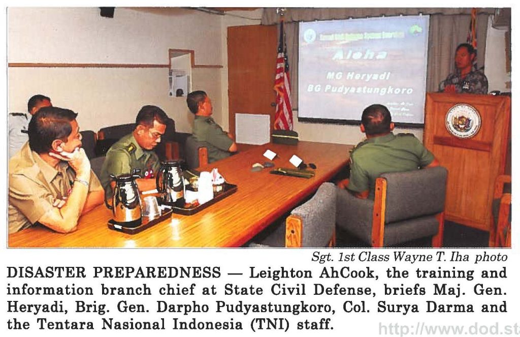 DISASTER PREPAREDNESS - Leighton AhCook, the training and information branch chief at State Civil Defense, briefs Maj. Gen. Heryadi, Brig. Gen. Darpho Pudyastungkoro, Col. Surya Darma and the Tentara Nasional Indonesia (TNI) staff.