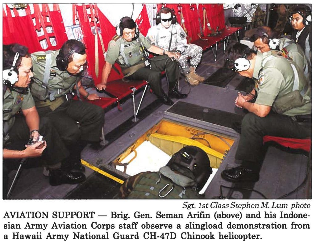 AVIATION SUPPORT - Brig. Gen. Seman Arifin (above) and his Indonesian Army Aviation Corps staff observe a slingload demonstration from a Hawaii Army National Guard CH-47D Chinook helicopter.