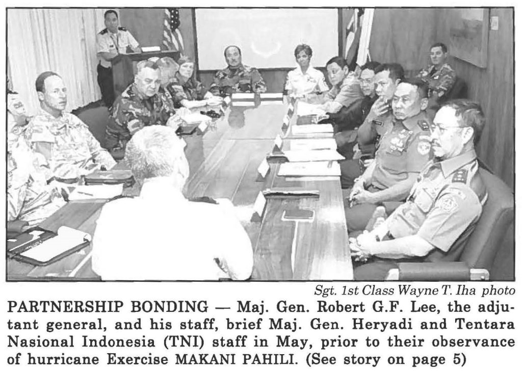 PARTNERSHIP BONDING - Maj. Gen. Robert G.F. Lee, the adjutant general, and his staff, brief Maj. Gen. Heryadi and Tentara Nasional Indonesia (TNI) staff in May, prior to their observance of hurricane Exercise MAKANI PAHILI. (See story on page 5)