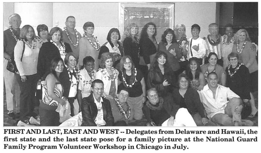 FIRST AND LAST, EAST AND WEST -- Delegates from Delaware and Hawaii, the first state and the last state pose for a family picture at the National Guard Family Program Volunteer Workshop in Chicago in July.