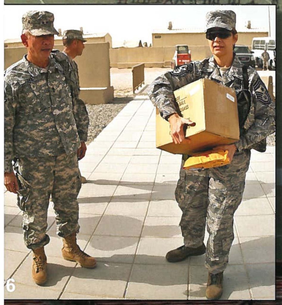 Maj. Gen. Robert G.F. Lee, the adjutant general and Command Chief Master Sgt. Denice M. Jelinski-Hall visit the troops during the holidays, bringing Operation GIFT LIFT goodies.