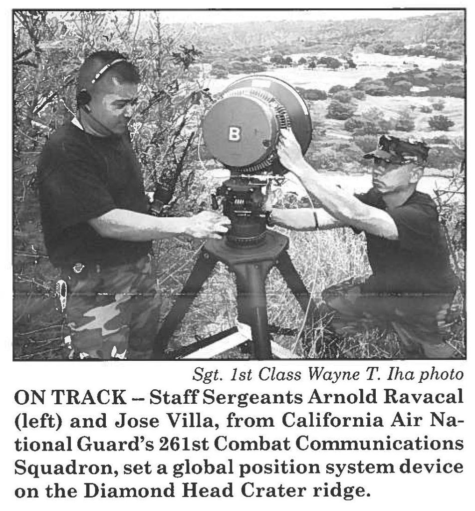ON TRACK- Staff Sergeants Arnold Ravacal (left) and Jose Villa, from California Air National Guard's 261st Combat Communications Squadron, set a global position system device on the Diamond Head Crater ridge.