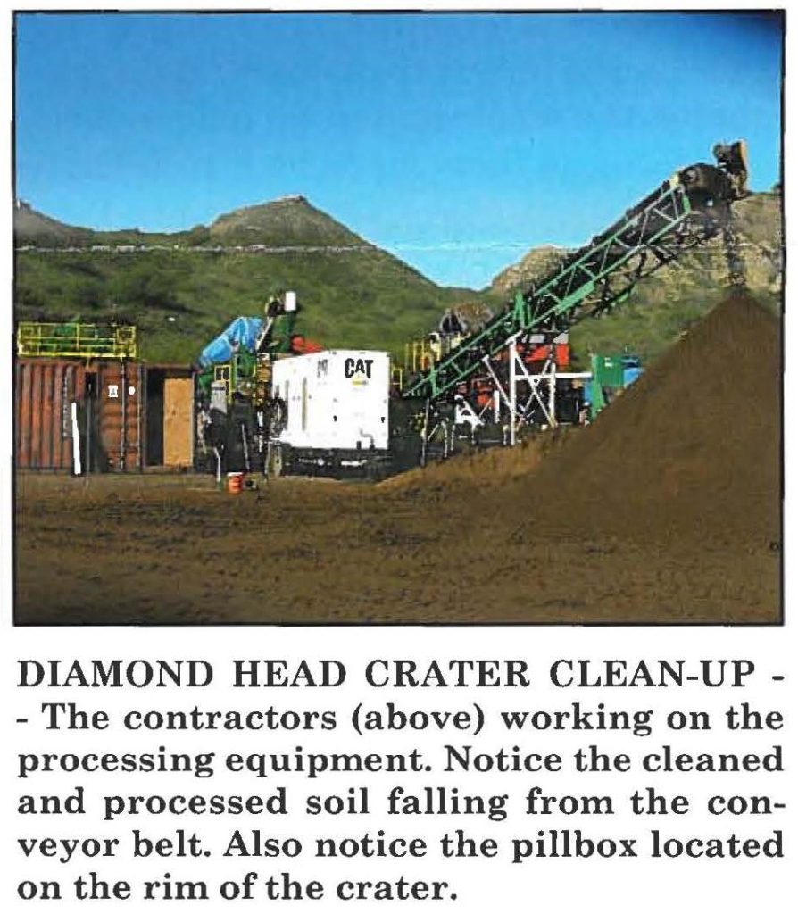DIAMOND HEAD CRATER CLEAN-UP -The contractors working on the processing equipment. Notice the cleaned and processed soil falling from the conveyor belt. Also notice the pillbox located on the rim of the crater.