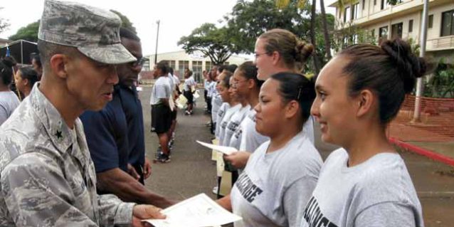 STEP ONE – Brig. Gen. Joseph K. Kim, the deputy adjutant general, present Hawaii Youth CHalleNGe Academy Cadets with their certificates of Pre-CHalleNGe completion. HING YCA photo
