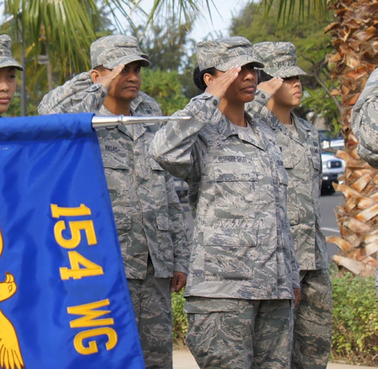 Lt. Col. Robin Tibaduiza receives command of the 154th Wing Comptroller Flight from Brig. Gen. Braden Sakai, Commander 154th Wing, during the change of command ceremony, April 11, 2015, Joint Base Pearl Harbor-Hickam (Air National Guard Photo by TSgt. Andrew Lee Jackson)