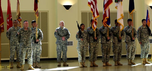 Soldiers wait in formation for the Hawaii Army National Guard change of command ceremony Aug. 2, 2015 at Kalaeloa, Hawaii. Brig. Gen. Bruce E. Oliveira relinquished authority to Brig. Gen. Keith Y. Tamashiro as the new HIARNG commander. (U.S. Army National Guard photo by Staff Sgt. Ryan Sheldon/Released)