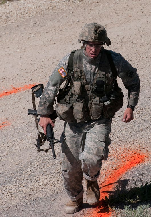 This year’s national level Best Warrior Competition takes place at Camp Williams, Utah. During the Range Run event, Soldiers and NCOs ran over six miles, stopping at various firing ranges along the way to test their skills with multiple weapons systems. This timed event covered grenade, machine gun, pistol and rifle expertise.