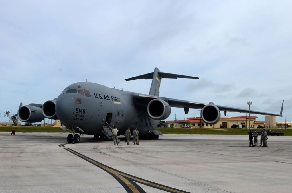 A C-17 Globemaster III assigned to the Hawaii Air National Guard at Joint Base Pearl Harbor-Hickam, Hawaii, arrives at Andersen Air Force Base, Guam, July 15, 2015, after evacuating more than 125 Department of Defense members from Wake Island in preparation for potential surges caused by Typhoon Halola. (U.S. Air Force photo by Airman 1st Class Alexa A. Henderson)