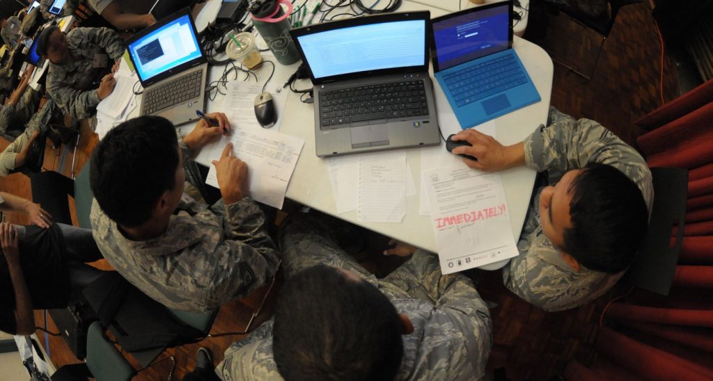 Hawaii Air National Guard Airmen evaluate network vulnerabilities during the Po’oihe 2015 Cyber Security Exercise at the University of Hawaii Manoa Campus Center Ballroom on June 4, 2015. Po’oihe is part of the hurricane preparedness Exercise Vigilant Guard / Makani Pahili 2015 hosted by U.S. Northern Command, National Guard Bureau and the Hawaii Emergency Management Agency. (U.S. Air National Guard photo by Airman 1st Class Robert Cabuco)