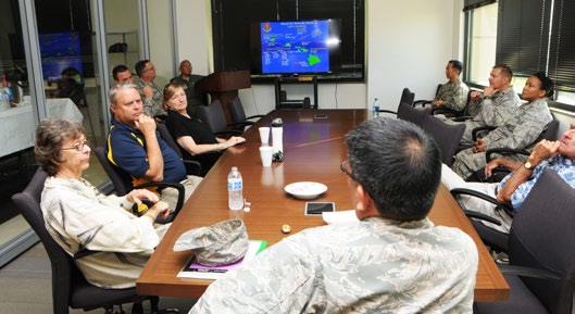 Hawaii Air National Guard commander, U.S. Air Force Brig. Gen. Ryan Okahara, briefs retired HIANG general officers on the current force structure of the HIANG, Nov. 16, 2015, Joint Base Pearl Harbor-Hickam. The briefing was part of a retired generals’ tour of the HIANG’s facilities and gave the former leaders a glimpse into the current status of the HIANG. (U.S. Air National Guard photo by Senior Airman Orlando Corpuz/released)