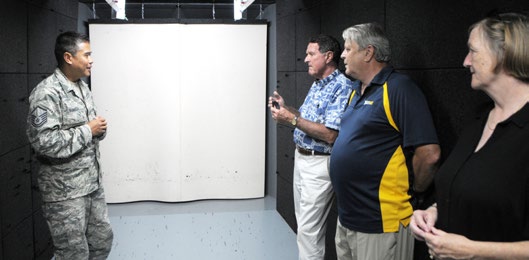 U.S. Air Force Master Sgt. Ricardo Namoca with the 154th Security Forces Squadron briefs Hawaii Air National Guard retired general officers on the HIANG’s new indoor shooting range, Nov. 16, 2015, Joint Base Pearl Harbor-Hickam. The briefing was part of a retired generals’ tour of the HIANG’s facilities and gave the former leaders a glimpse into the current status of the HIANG. (U.S. Air National Guard photo by Senior Airman Orlando Corpuz/released)