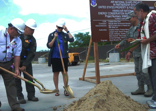 Retired U.S. Air Force Brig. Gen Stanley Osserman and U.S. Air Force Brig. Gen. Braden Sakai, Commander, 154th Wing, Hawaii Air National Guard prepare to shovel dirt at the ground breaking ceremony for a solar array farm being built for the HIANG at Joint Base Pearl Harbor-Hickam, Oct. 27, 2015. The solar array facility will be one piece of the HIANG’s renewable energy strategy to decrease it’s electricity expense and increase it’s energy security. (U.S. Air National Guard photo by Senior Airman Orlando Corpuz/Released)