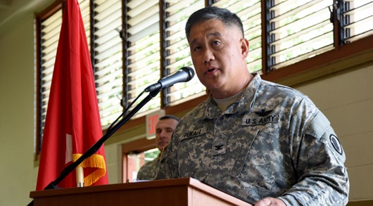 Col. Roger Pukahi, the new commander of the 103rd Troop Command, gives his remarks during the 103rd Troop Command change of command ceremony at the Hawaii Army National Guard armory on Oct. 3, 2015. Pukahi’s experience as a rotary-wing aviator will benefit him during his command of the 103rd Troop Command, a substantial part of which is comprised of soldiers from Company B, 777th Aviation Support Battalion. (U.S. Army National Guard photo by Pfc. Paul D. Berzinas/Released)