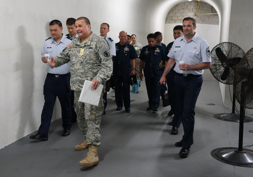 As Hurricanes Madeline and Lester were bearing down on the state, regular operations didn’t stop. Maj. Jeff Hickman provided a DOD briefing and Joint Operations Center tour to a delegation from the Philippines Air Force, Headquarters for Pacific Command and the National Guard Bureau State Partnership Program.