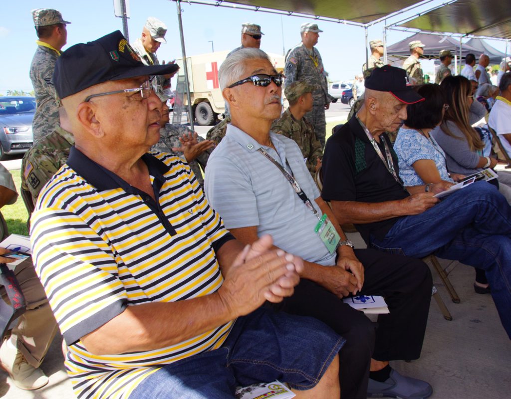 BRIGADE’S FINEST – Retired Hawaii Army National Guard Vietnam veterans 1st Sgt. Sonny Gollero, Master Sgt. Bruce Hidano, and Chief Warrant Officer Paul Kahuanhana enjoy the Vietnam call-up speakers during the morning ceremony at the 29th Infantry Brigade Readiness Center. (Retired Master Sgt. Stephen M. Lum photo)