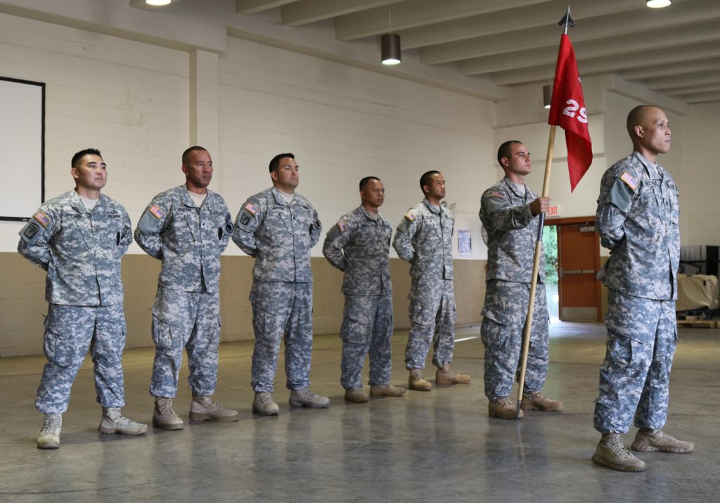 The Soldiers from the 297th Engineer Detachment Fire Fighting Team stand in formation during their deployment ceremony at the 103rd Troop Command Armory in Pearl City, Hawaii on July 18, 2017. The Fire Fighting Team’s mission is to provide fire protection for aviation assets and major facilities in any theater of operations. (U.S. Army National Guard photo by Spc. Lisa K. Lariscy)