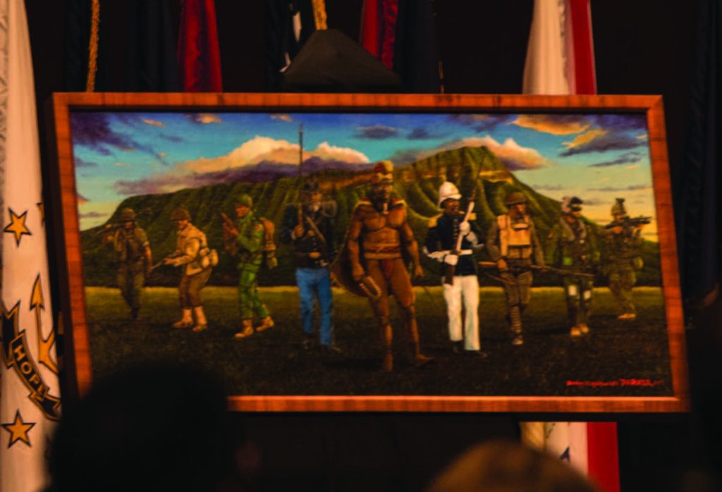 Guests sing “The Army Goes Rolling Along” during the Hawaii National Guard Birthday Commemoration at Honolulu, Hawaii Dec. 15, 2017 at the Hawaii Convention Center. The birthday ball celebrated 381 years of the Hawaii National Guard.