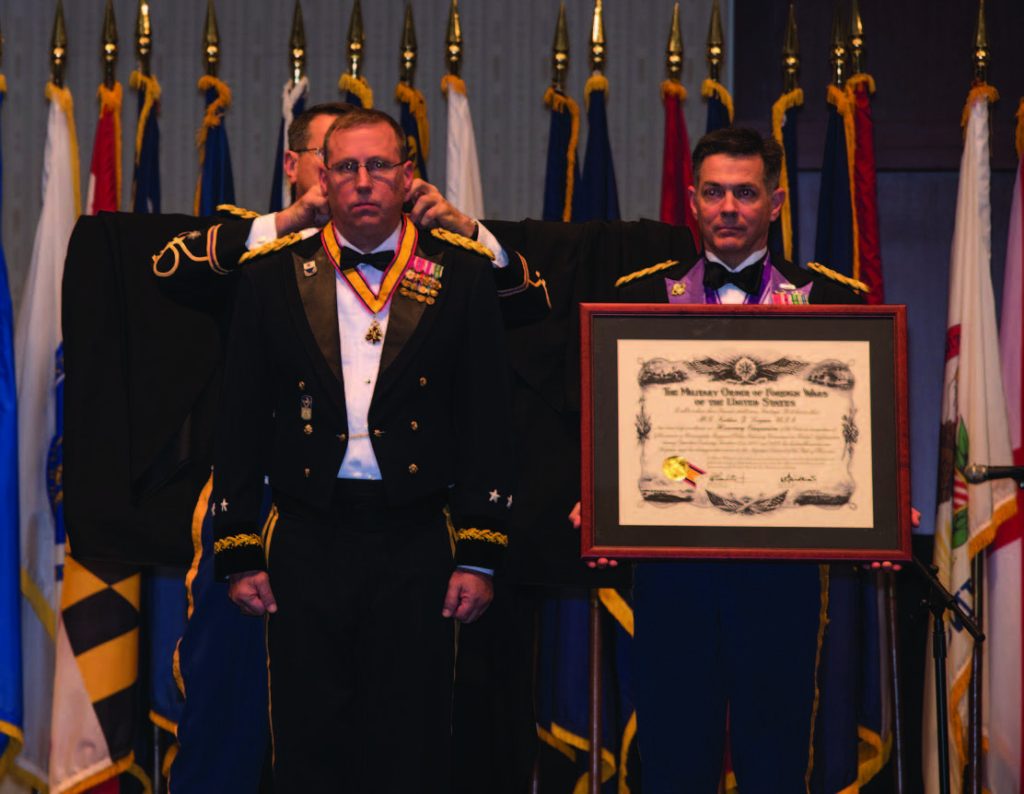 Maj. Gen. Arthur J. Logan receives an award during the Hawaii National Guard Birthday Commemoration at Honolulu, Hawaii Dec. 15, 2017 at the Hawaii Convention Center. The birthday ball celebrated 381 years of the Hawaii National Guard. (U.S. Army National Guard photo by Sgt. Amanda H. Gerlach)